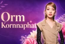 Thai actress Orm Kornnaphat posing for a professional portrait.